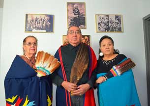 Three Ponca elders in traditional clothing
