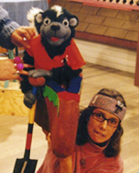 Puppet or not, you'd be making that face too if you had to stick your hand there on a skunk.